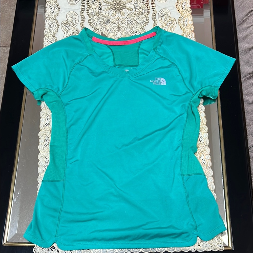 The North Face green short sleeved t-shirt